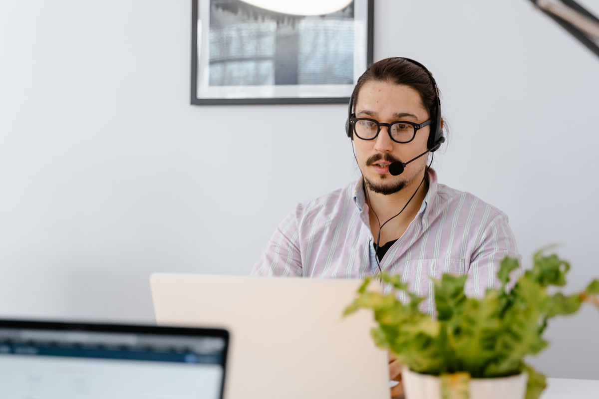 Customer support specialist assisting a client